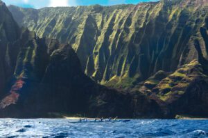 Creighton and Kailua Canoe Club Paddling Off Kauai. Photo Courtesy of Creighton Litton.