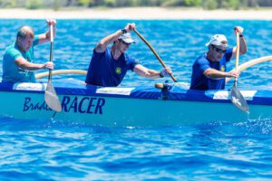 Creighton, Center, Racing with The Kailua Canoe Club. Photo Courtesy of Creighton Litton.